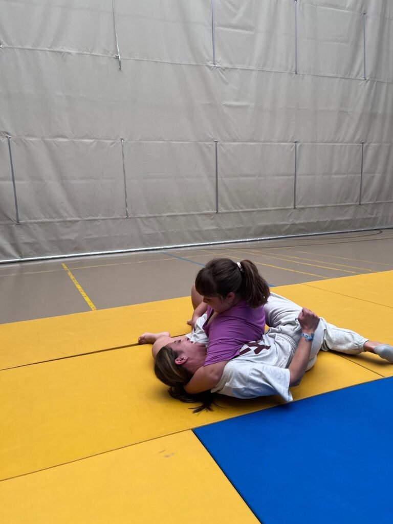 Padres e hijos, sobre el tatami.
